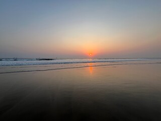 Orange light of sunset on beach in Karachi looking very nice.