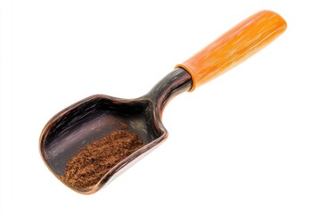 Scoop made of wood holding cocoa powder, ideal for baking and cooking
