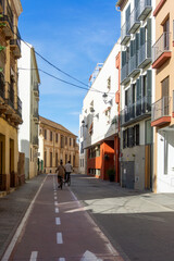 Obraz premium Cycling in Historic Centre of Malaga, Spain.