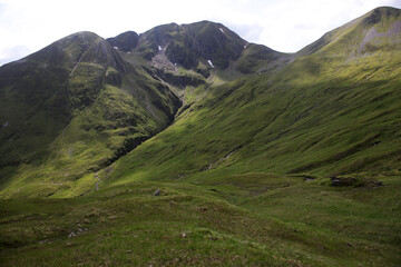 Fototapeta premium Ascent path to Binnein Mor and Na Gruagaichean - View towards Glen Nevis and water of Nevis valley - Mamores - Highlands - Scotland - UK