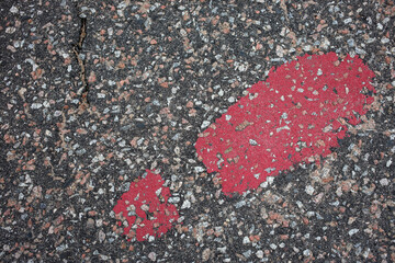 Red footprint on the tarmac - Beach esplanade - Aberdeen city - Scotland - UK