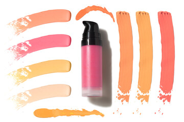 lotion cream foundation primer in cosmetic makeup bottle package and color smudge