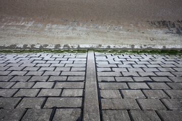 Fototapeta premium Concrete protection wall and sandy beach - Beach esplanade - Aberdeen city - Scotland - UK