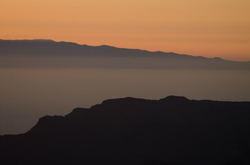 Silhouette of the east of the island of Tenerife from Gran Canaria at sunset. Canary Islands. Spain.