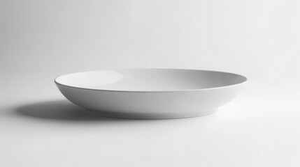 Modern White Ceramic Plate with Smooth Surface and Elegant Design Perfect for Minimalist Table Settings and Culinary Presentations