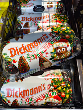 Berlin, Germany - December 12, 2024: View to a shelf with various packs Christmas sweets in a supermarket.