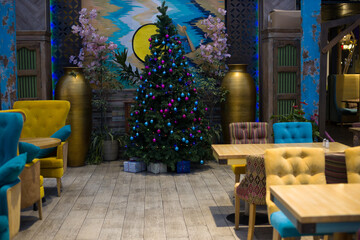 Obraz premium a modern bright restaurant with upholstered chairs. Banquet hall for the holidays