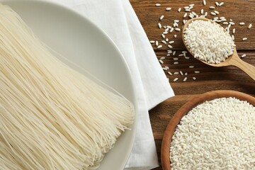 Rice noodles. Rice and noodles on wooden background