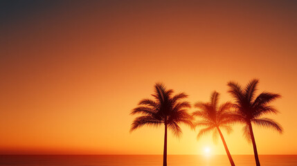 Obraz premium Silhouette of palm trees against a vibrant sunset, symbolizing relaxation and nature.