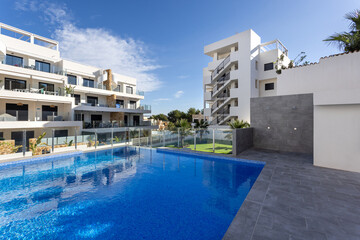 Modern Apartment Complex with Pool and Terrace