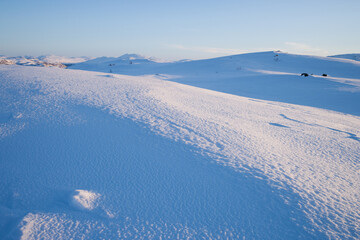 evening light over a beautiful winter landscape in norway