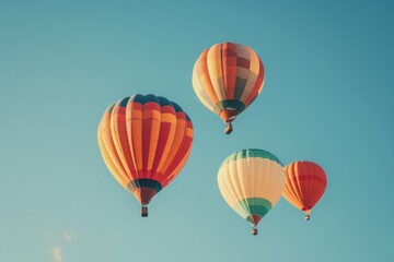Fototapeta premium freedom and beauty of hot air balloons adrift in the clear blue sky,