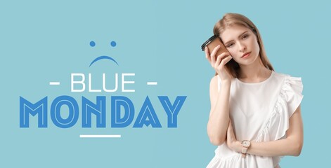 Tired young woman with cup of coffee and text BLUE MONDAY