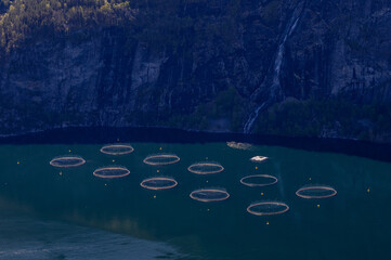 Fish farm, with the river flowing in the background.