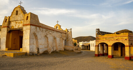 Rustic Old Western Town: Weathered Wooden Buildings, Historical Church and Cuartel Against a Desert Landscape, Capturing the Nostalgia and Charm of a Bygone Frontier Era