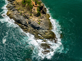 Amazing top view seashore, Aerial view of Tropical beach sea in the beautiful Phuket island Thailand