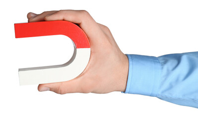 Man with horseshoe magnet on white background, closeup