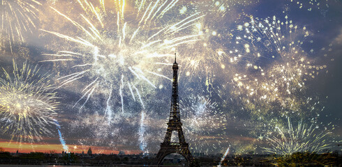 fireworks over Eiffel tower New Year in Paris
