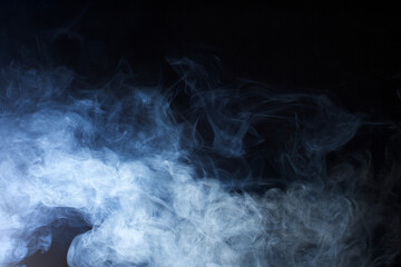Blue/Grey Hazy smoke and fog on a black background
