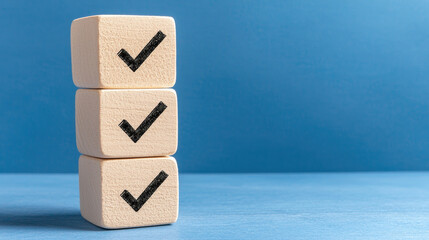 Check mark Stacked wooden blocks with check marks on blue background symbolize completion and success. with copy space and business design