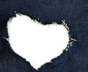 the heart forms an opening in the blue denim.