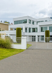Two story luxury house with beautiful summer  landscape in Vancouver, Canada, North America. Day time on June 2024.