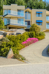 Two story luxury house with beautiful summer  landscape in Vancouver, Canada, North America. Day time on June 2024.