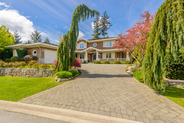 Two story luxury house with beautiful summer  landscape in Vancouver, Canada, North America. Day...