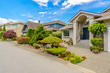 Two story luxury house with beautiful summer  landscape in Vancouver, Canada, North America. Day...