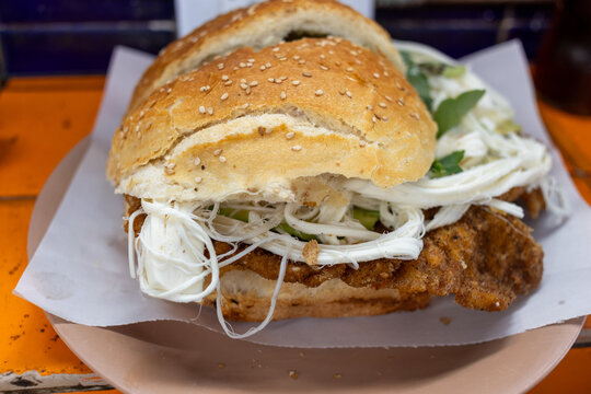 Cemita poblana : typical mexican food from Puebla including oaxaca cheese, papalo and meat