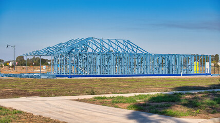 Blue metal framework of a new residential home