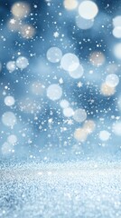 Winter wonderland scene. Light blue blurred background with snowflakes, glitter. Festive atmosphere. Perfect for holiday cards or website backgrounds. Glittering winter wonderland. Festive, dreamy.