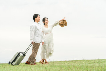 旅行・リゾート・新婚旅行・ハネムーンに来た夫婦・カップル 