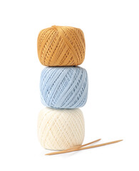 Colorful knitting yarn with needles on white background
