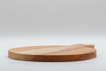 wooden cutting board on gray background