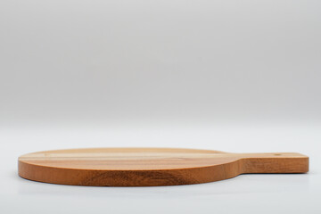 wooden cutting board on gray background