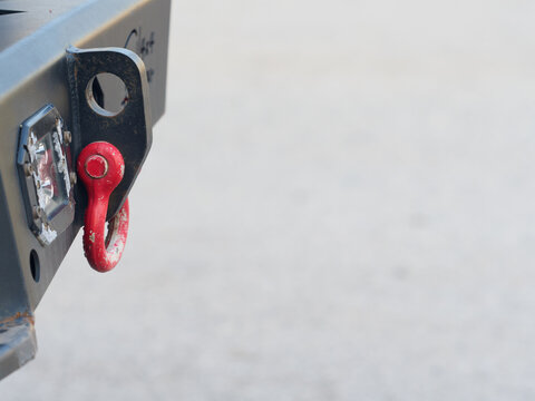 Recovery point for vehicle towing and off-road use consists of a D-ring attached to a tow hitch mount designed for installation on the rear bumper.