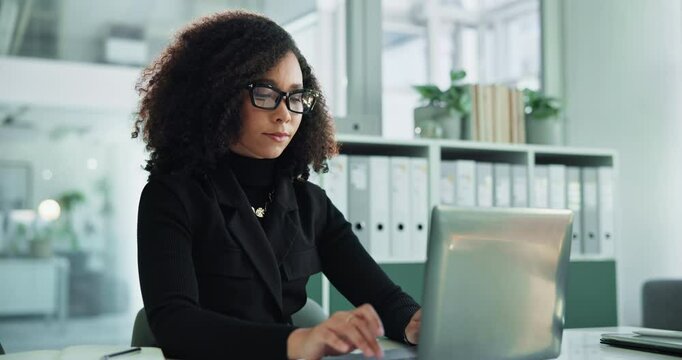 Laptop, typing and business woman planning, review update or reading compliance feedback in office. African worker, computer and writing email for policy development, rules or check regulation report