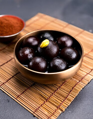 Kala Jamun or Black Gulab Jamun is a delicious and juicy sweet snack
