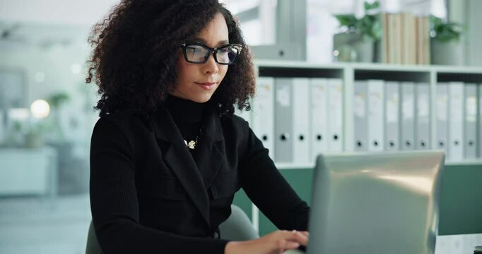 Computer, typing and business woman planning, review update or reading compliance feedback in office. African worker, laptop and writing email for policy development, rules or check regulation report