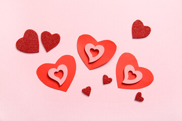 Composition with beautiful hearts on pink background. Valentine's Day celebration