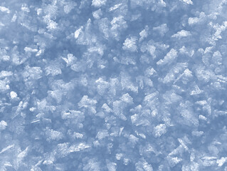 Background of winter snow texture. Small ice crystals on surface of snow natural background