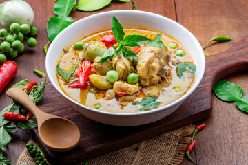 Chicken Green Curry or pork Asian food Thai food on a bowl of soup with a mixture of herbs, vegetables and pepper spices.