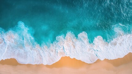 Fototapeta premium Aerial View of Turquoise Ocean Waves Crashing on Sandy Beach