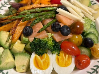 Fresh vegetable salad with a vibrant mix of greens, cherry tomatoes, cucumbers, and bell peppers. Crisp, colorful, and packed with vitamins, this salad makes a healthy, delicious meal or side.

