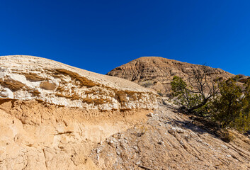 White Volcanic Ash Ridge and Desert Landscape at The Nambe Badlands, Nambe, New Mexico, USA