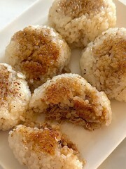 Jumeok-bap(fist rice) or rice ball is a lump of cooked rice made into a round loaf the shape of a fist. often eaten as a light meal, between-meal snack, street food, or an accompaniment to spicy food
