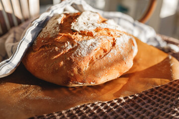 Closeup of fresh baked sourdough loaves with a textured crust, ready for service at a traditional bakery, artisanal bread
