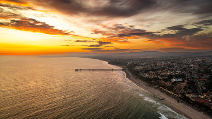 Breathtaking aerial sunset views of San Clemente beach showcasing coastline and pier