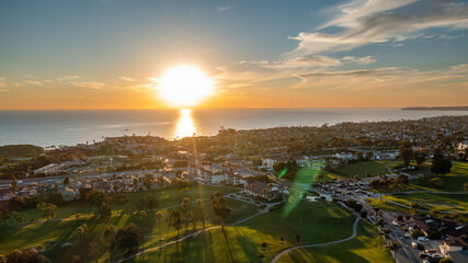 Breathtaking aerial view of the San Clemente coastline at sunset showcasing vibrant colors and serene ocean waves